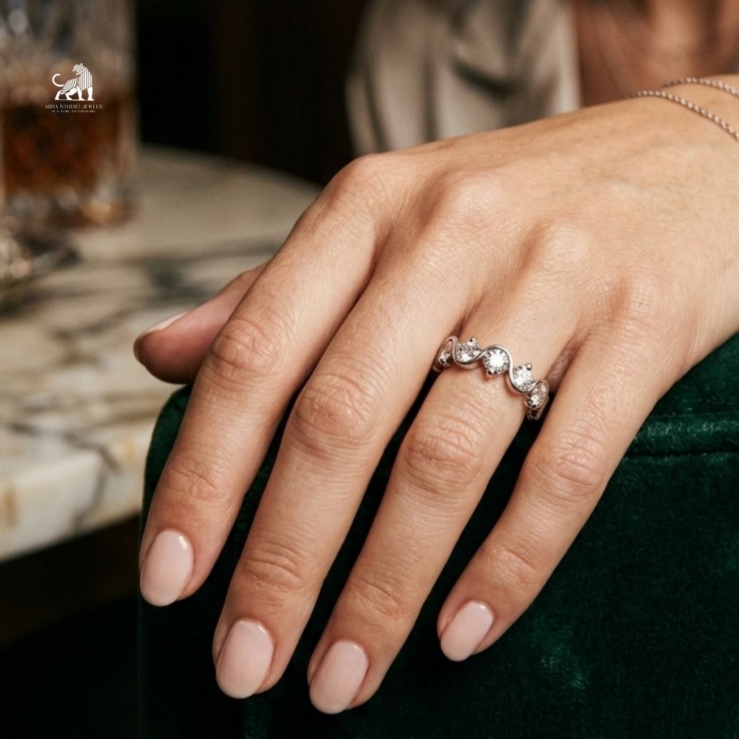 The Celeste Wave Diamond Ring worn on a hand