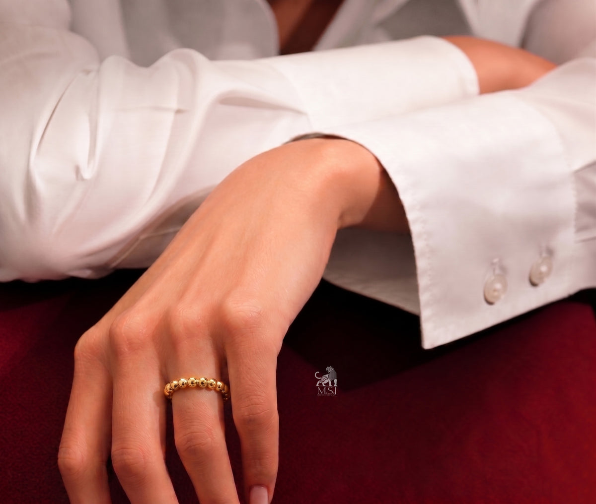 Beaded Harmony Band Ring worn on a hand