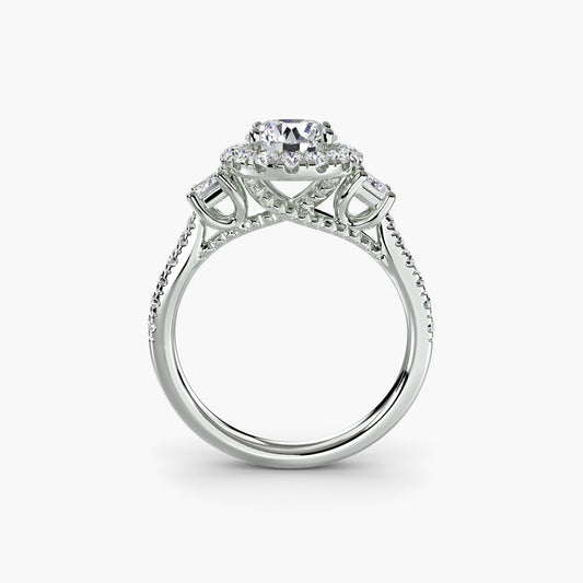 Lab-grown diamond three-stone ring with halo on a white background