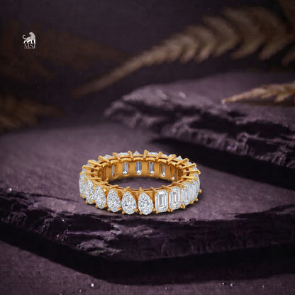 Duo-Cut Pear & Emerald Eternity Band