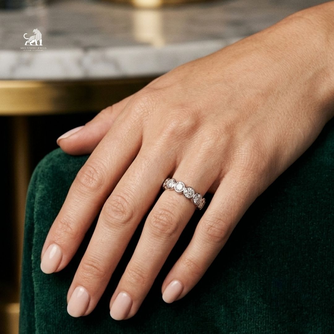 The Oval Embrace Diamond Eternity Ring worn on a hand