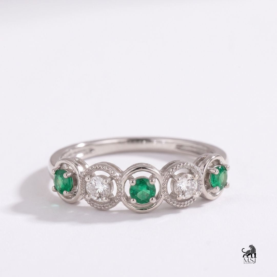 Emerald and Diamond Five-Stone Vintage Halo Ring