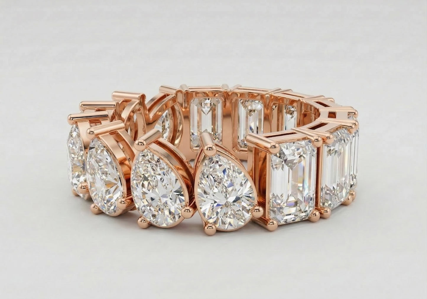 Duo-Cut Pear & Emerald Eternity Band