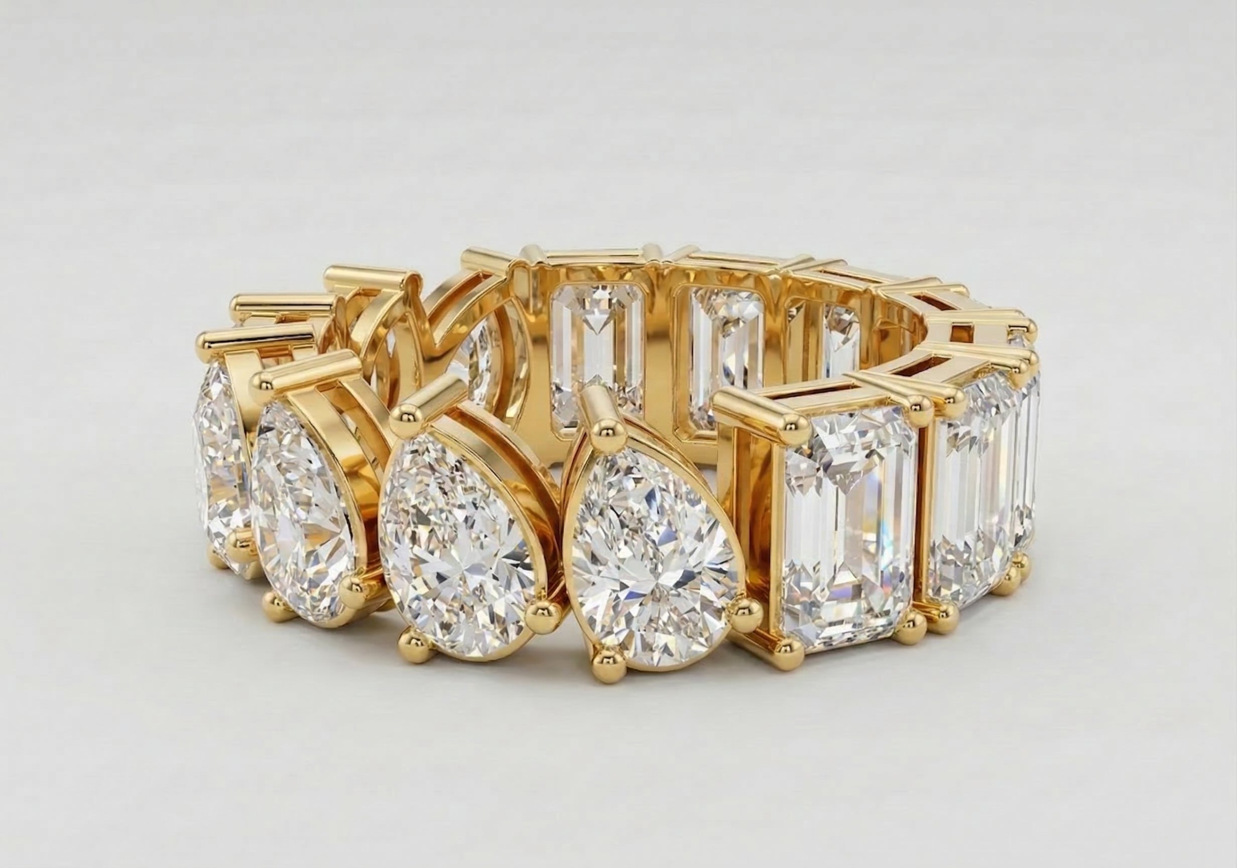 Duo-Cut Pear & Emerald Eternity Band