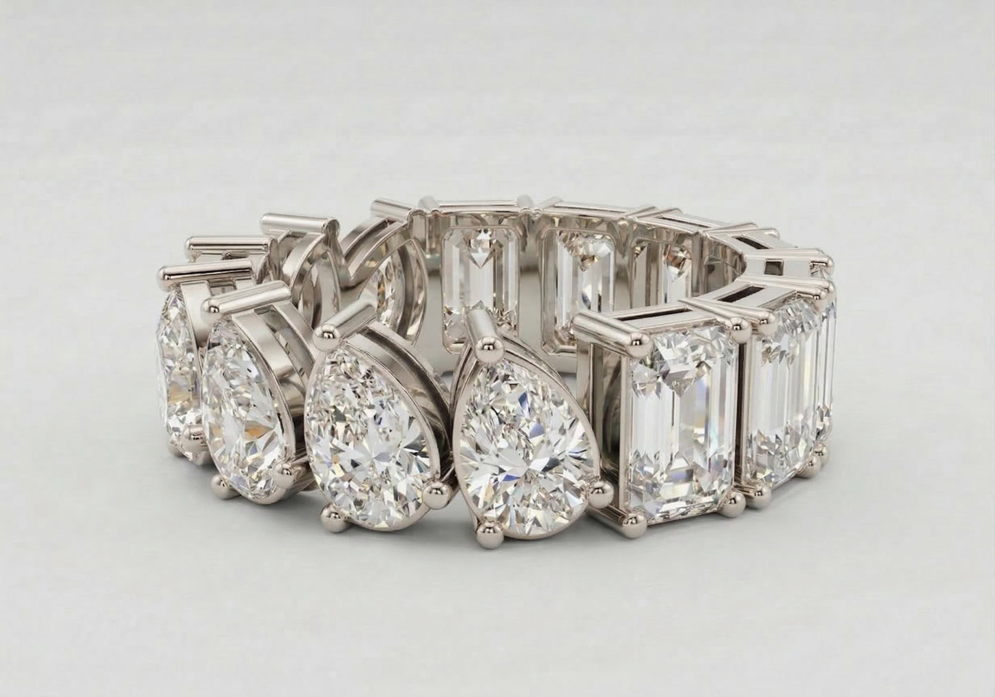 Duo-Cut Pear & Emerald Eternity Band