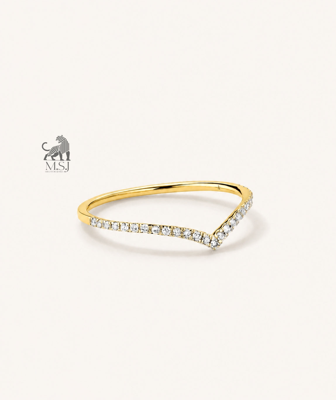 The V-Shaped Diamond Chevron Ring in yellow gold