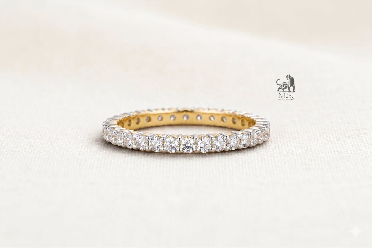The Lumière Two-Tone Diamond Eternity Ring in yellow gold