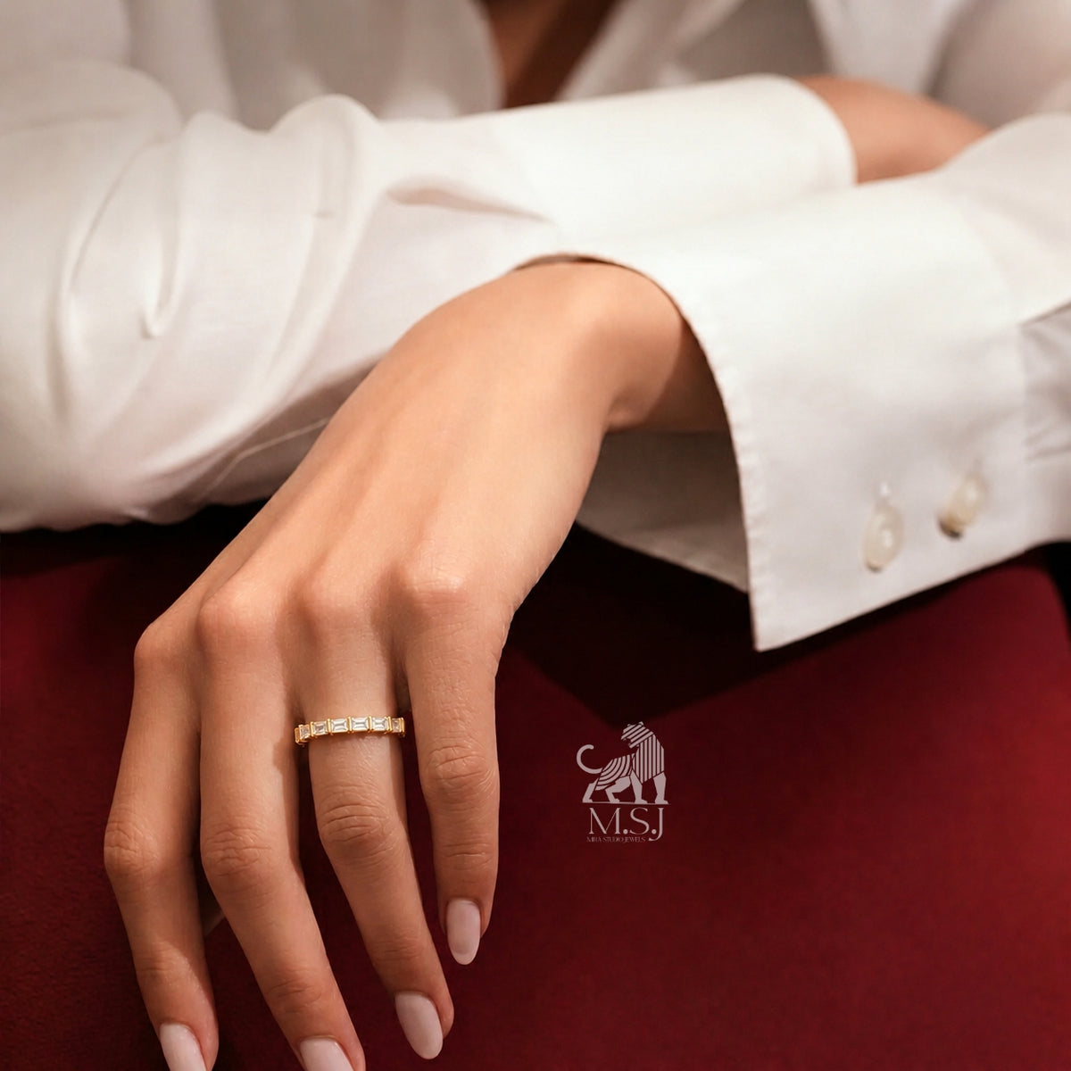 Emerald Cut Diamond Eternity Band worn on a hand