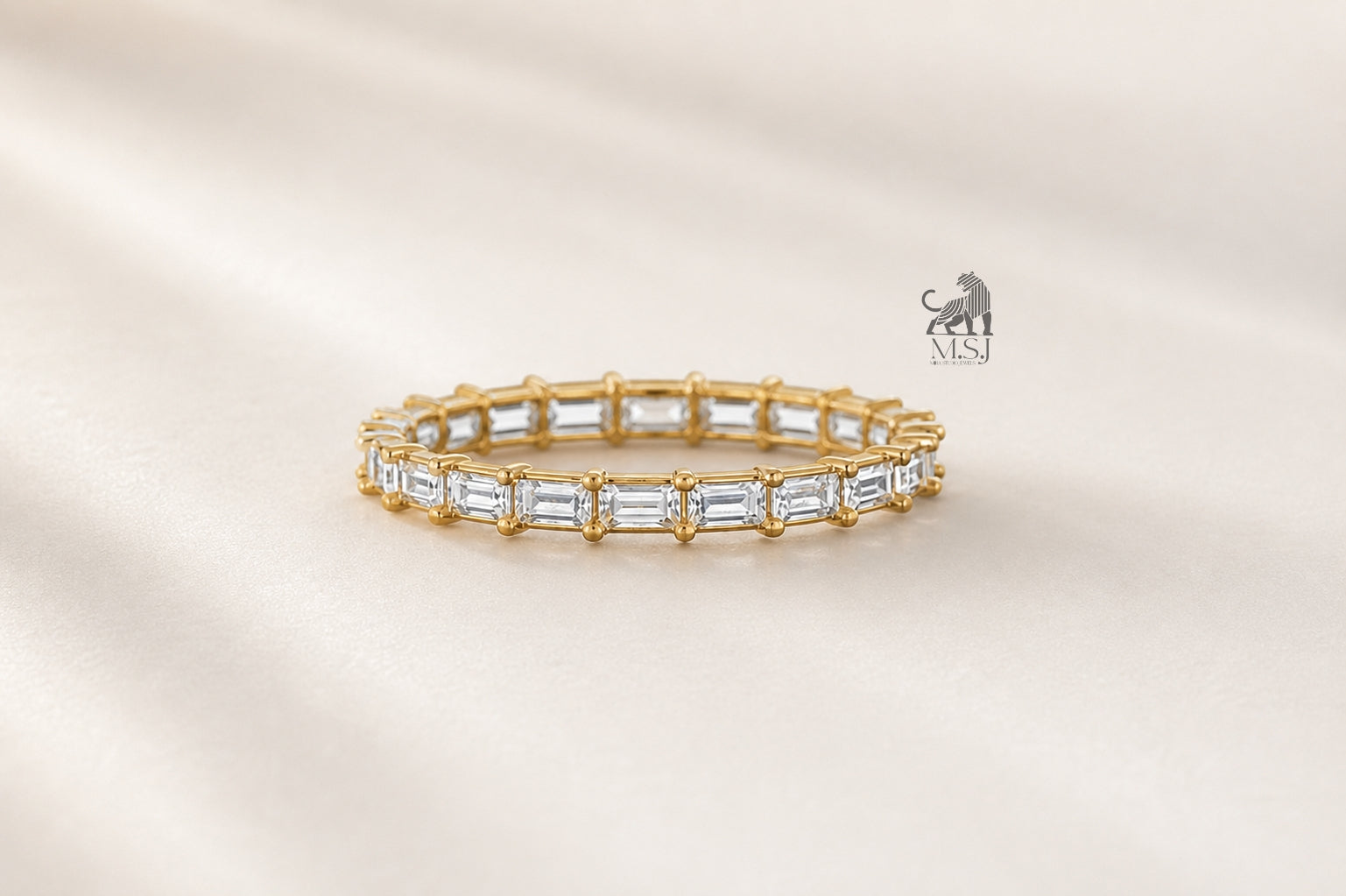 Emerald Cut Diamond Eternity Band in yellow gold