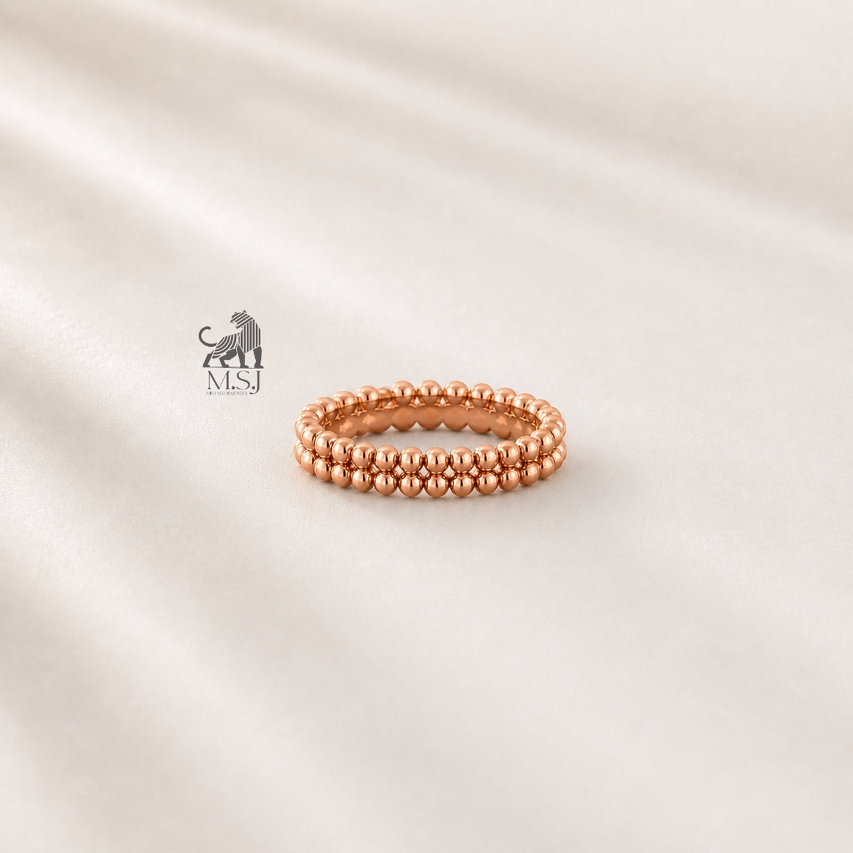 The Solara Beaded Gold Ring in rose gold