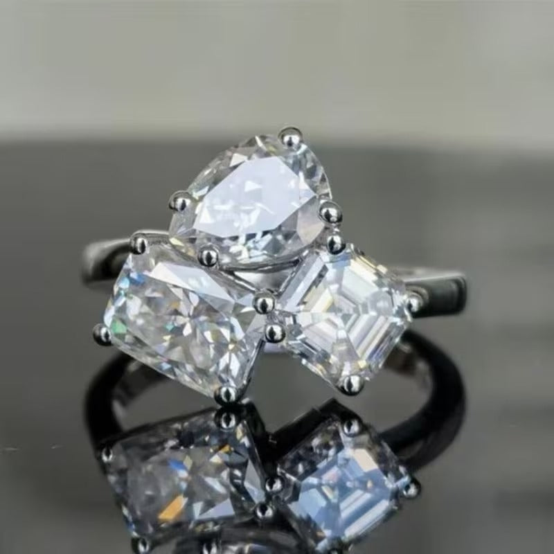 The Geometric Trio Ring