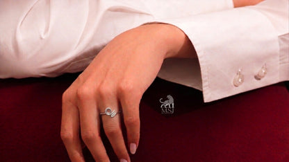 Infinity Loop Diamond Accent Ring worn on a hand