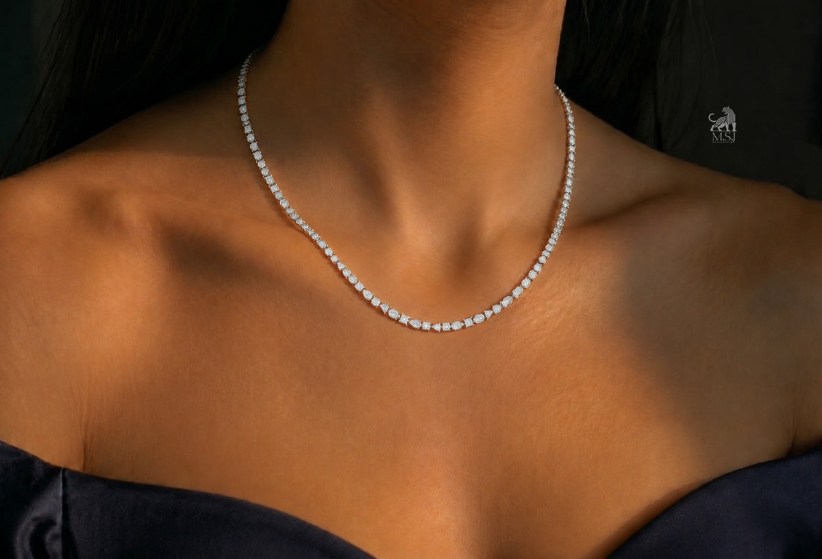 The Élan Mixed-Cut Diamond Tennis Necklace worn around the neck
