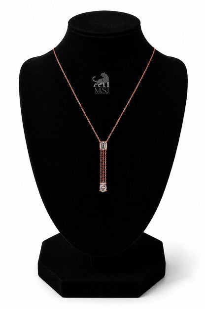 The Elara Emerald & Pear Drop Necklace in rose gold