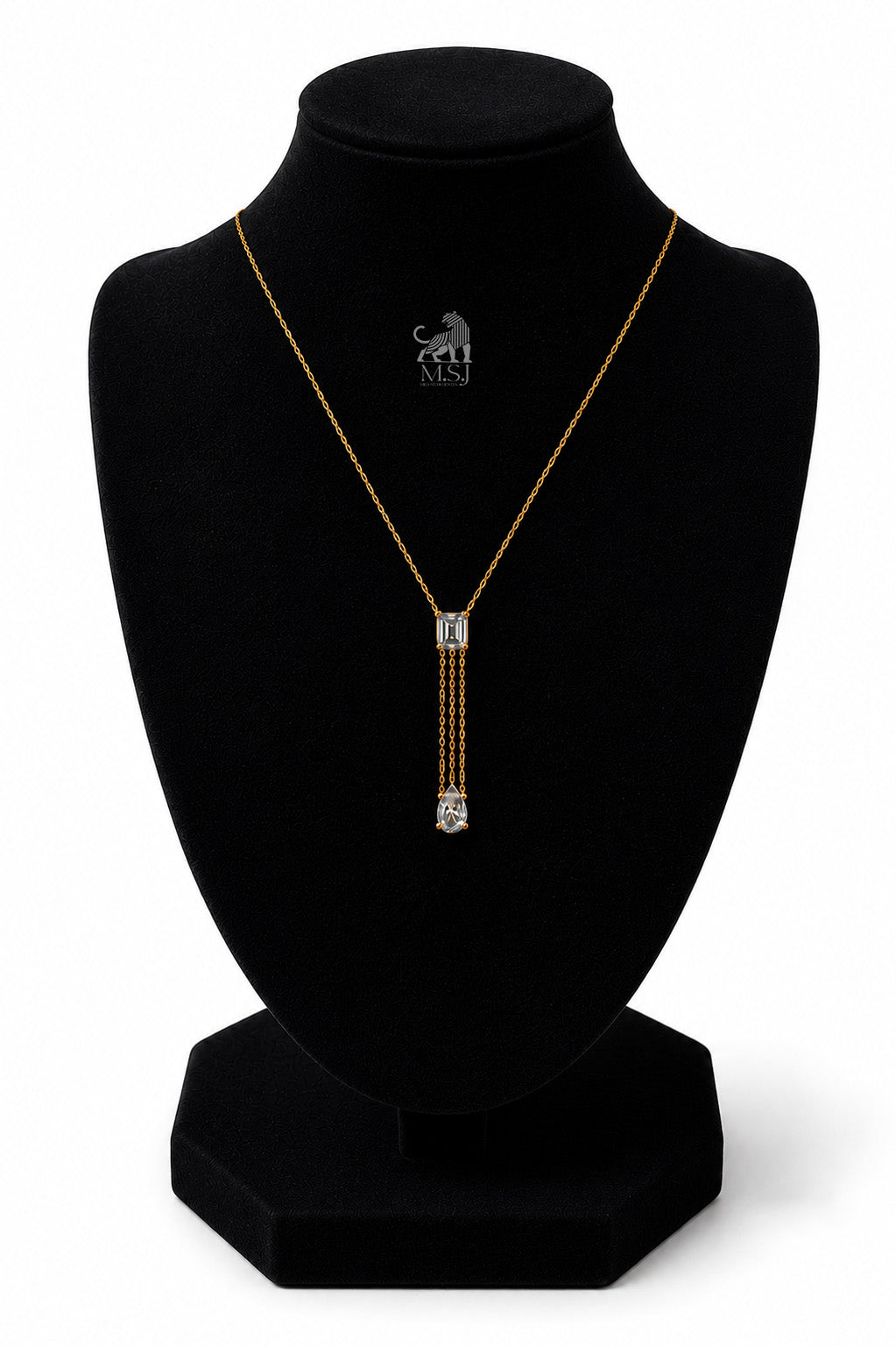 The Elara Emerald & Pear Drop Necklace in yellow gold