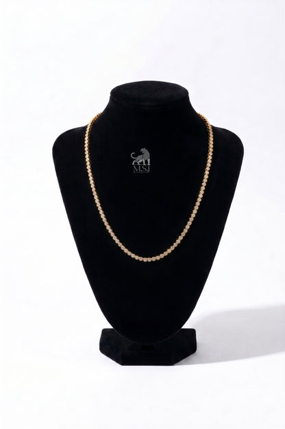 The Étoile Round Diamond Tennis Necklace in yellow gold