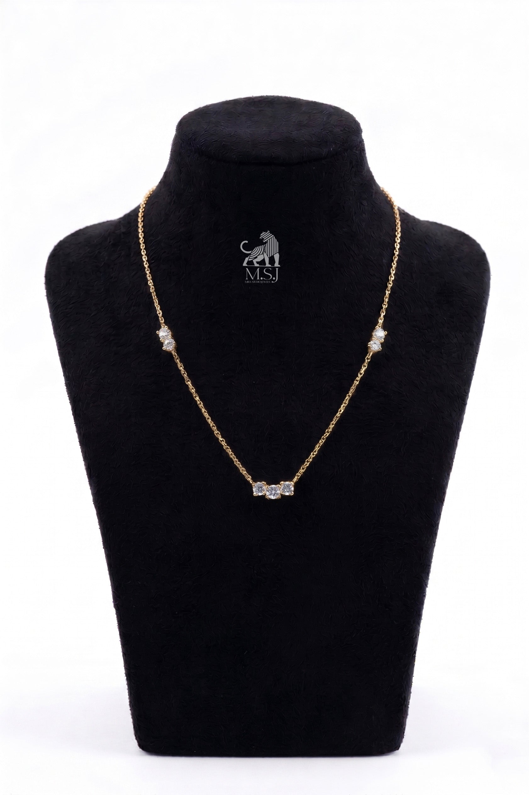 The Amara Diamond Trio Necklace in yellow gold