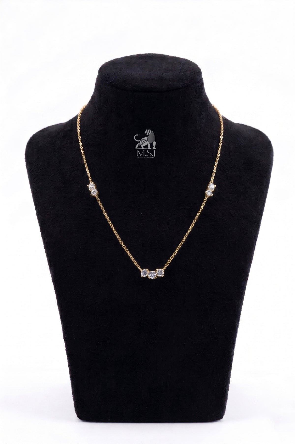 The Amara Diamond Trio Necklace in yellow gold
