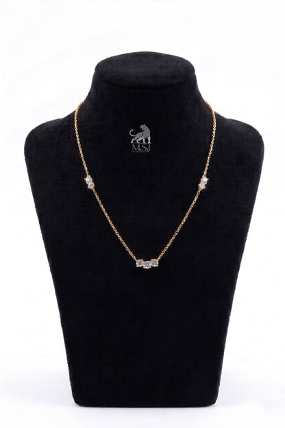 The Amara Diamond Trio Necklace in yellow gold