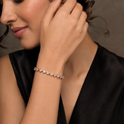 Vela Heartline Diamond Tennis Bracelet worn on a wrist