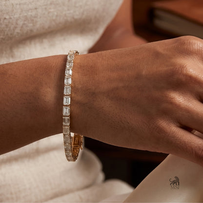 Linear Emerald Diamond Tennis Bracelet worn on a wrist