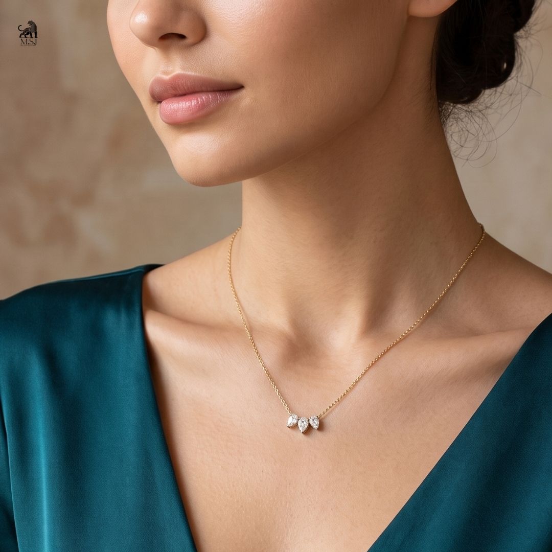 Trivelle Pear Drop Diamond Necklace worn around the neck