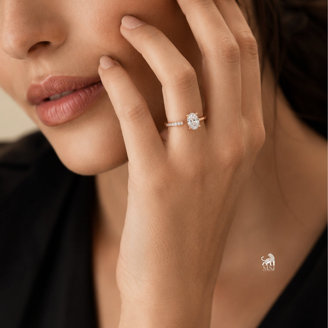The Meridian Open Oval Ring worn on a hand