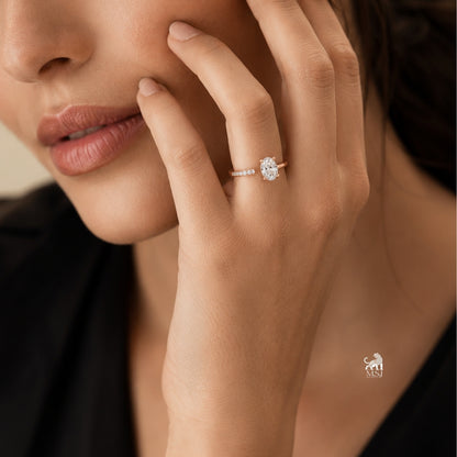 The Meridian Open Oval Ring worn on a hand