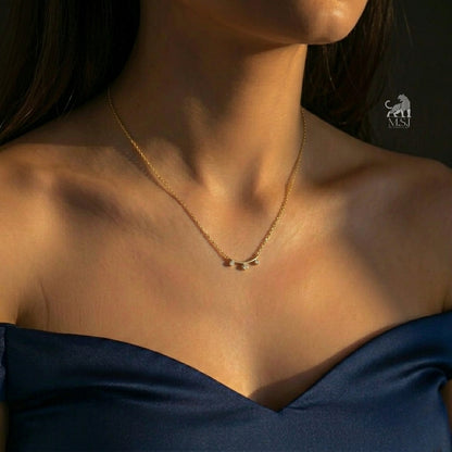 Aveline Trio Diamond Curve Necklace worn around the neck