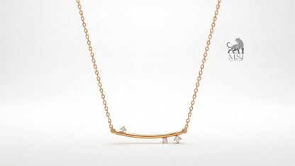The Celeste Arc Diamond Bar Necklace in yellow gold