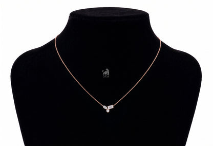 The Elara Three-Stone Diamond Necklace in rose gold