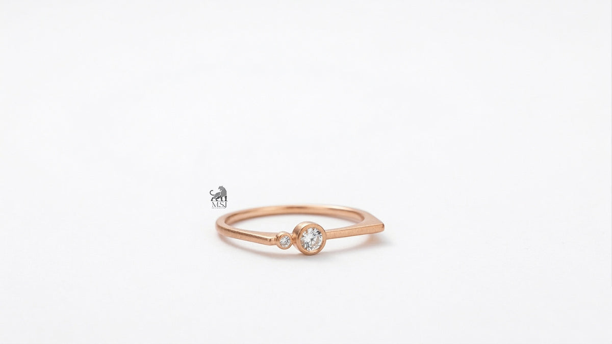 The Solenne Twin Diamond Bezel Ring in rose gold