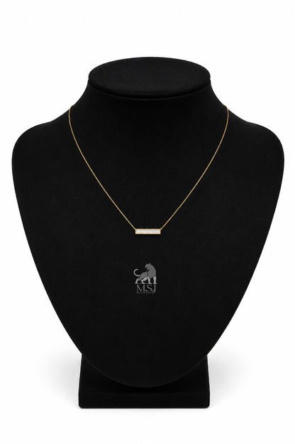The Élan Baguette Bar Diamond Necklace in yellow gold